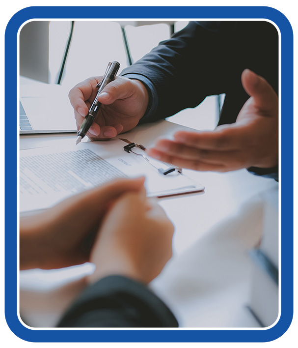 Attorney reviewing documents with a client