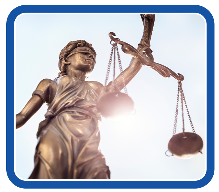 Statue of Lady Justice holding scales