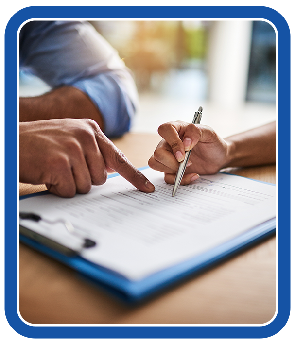 Attorney guiding a client through a document